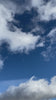 Calming Blue Sky with Drifting Clouds – Mobile-Shot Stock Video, Portrait (HD, 9:16)