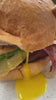 Hamburger with egg dripping